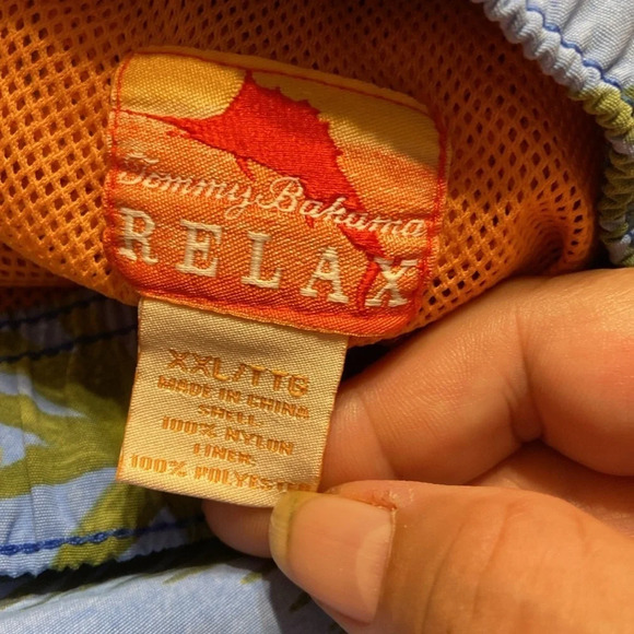 Tommy Bahama swimming trunks. Mesh under wear are orange on blue
A/28 - Picture 4 of 5